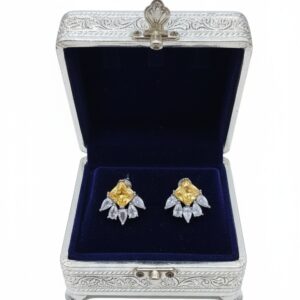 Yellow studs with zircon