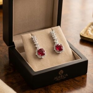 Silver earrings with red zircon